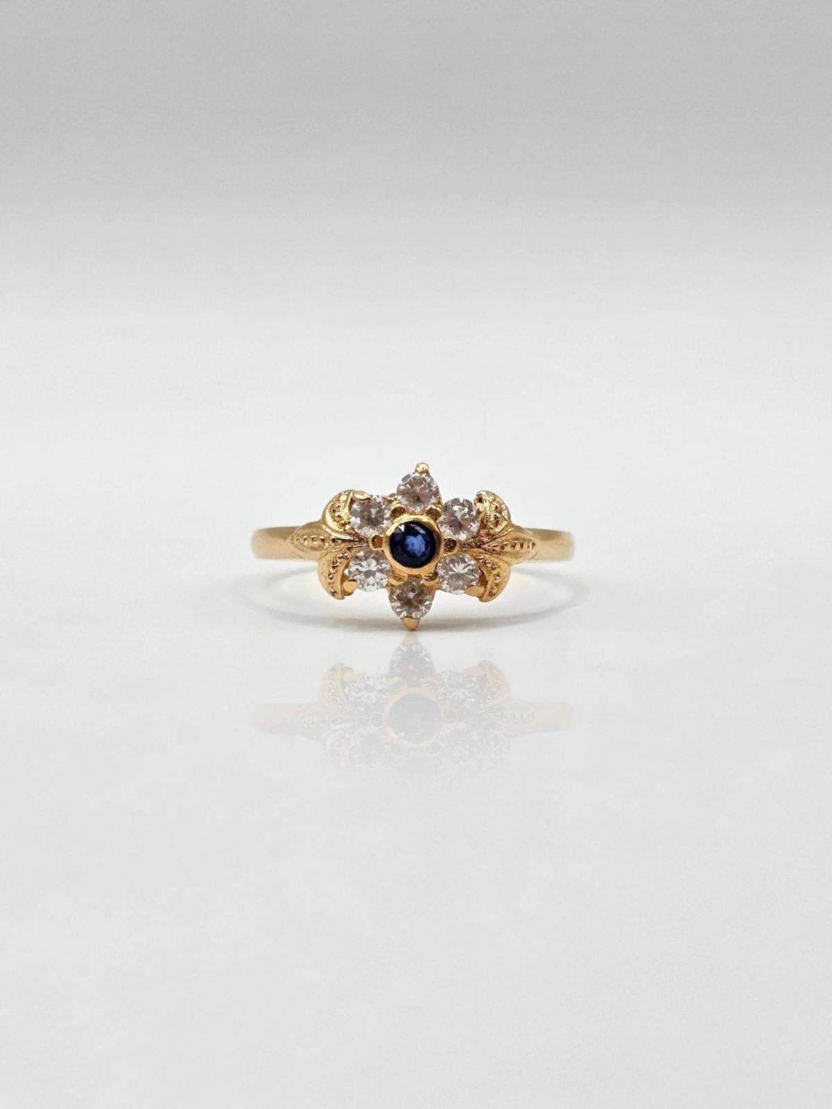 ANILLO FLOR CIRCONES N18,5
