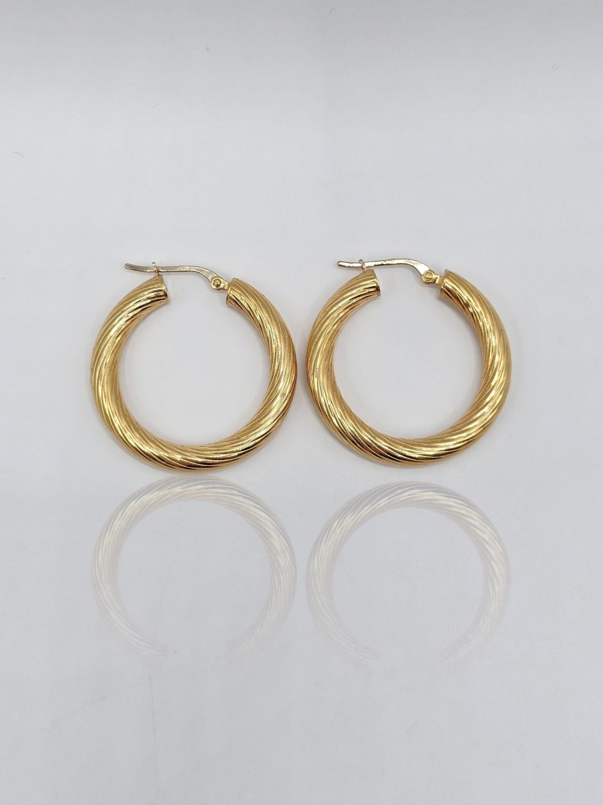 PENDIENTES ARO LINEAS EN ESPIRAL