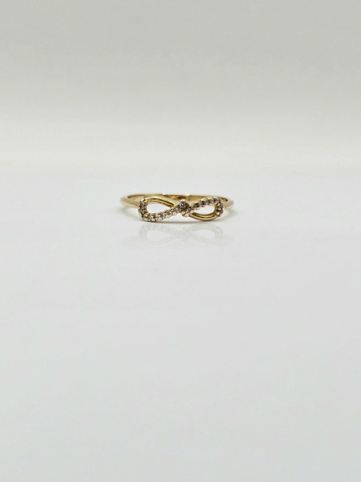 ANILLO INFINITO CON CIRCONES N16