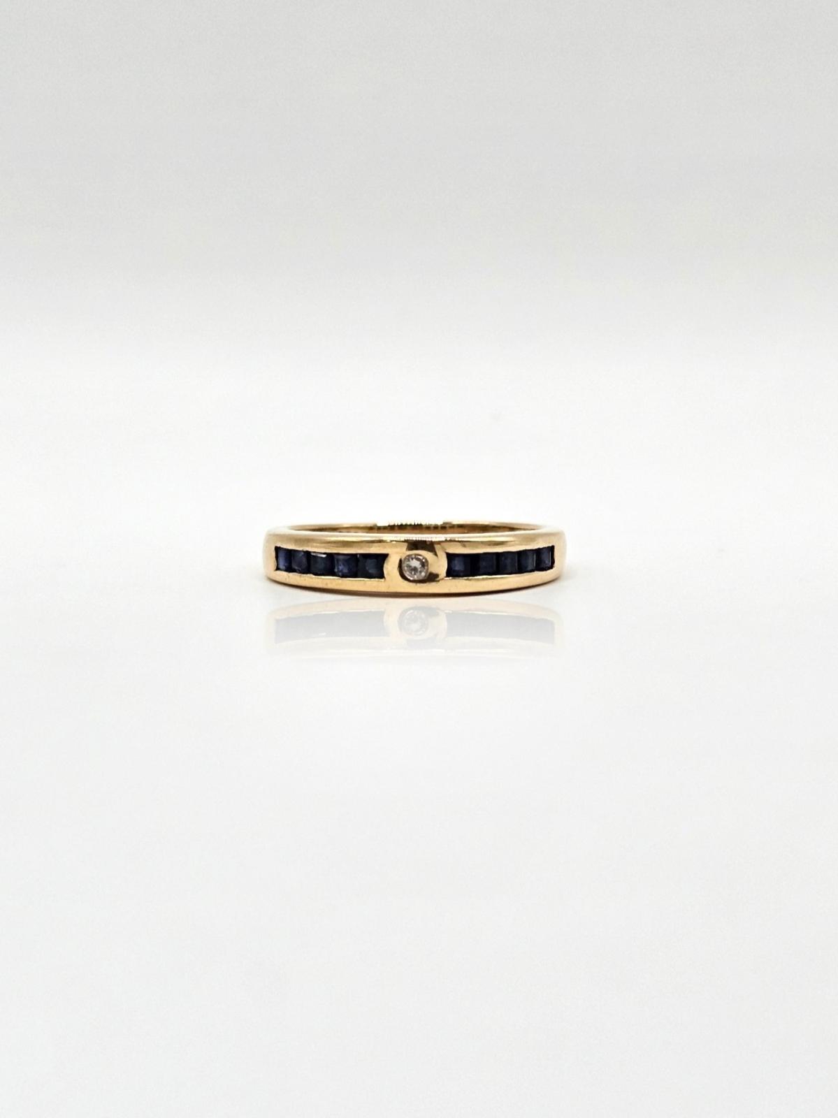 ANILLO CON ZAFIROS N14,5